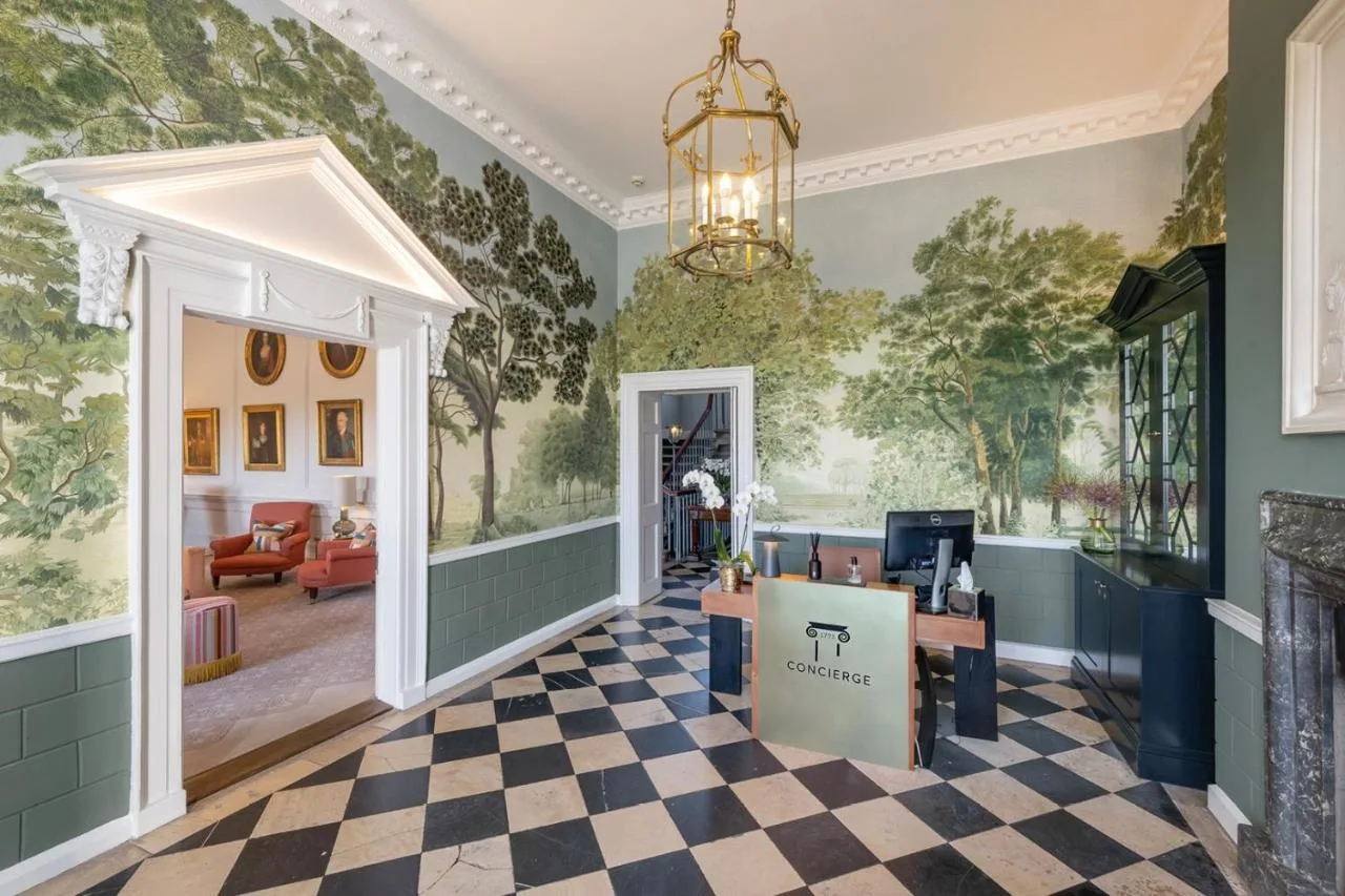 A suite with a wall mural of a living room at the Royal Crescent Hotel & Spa